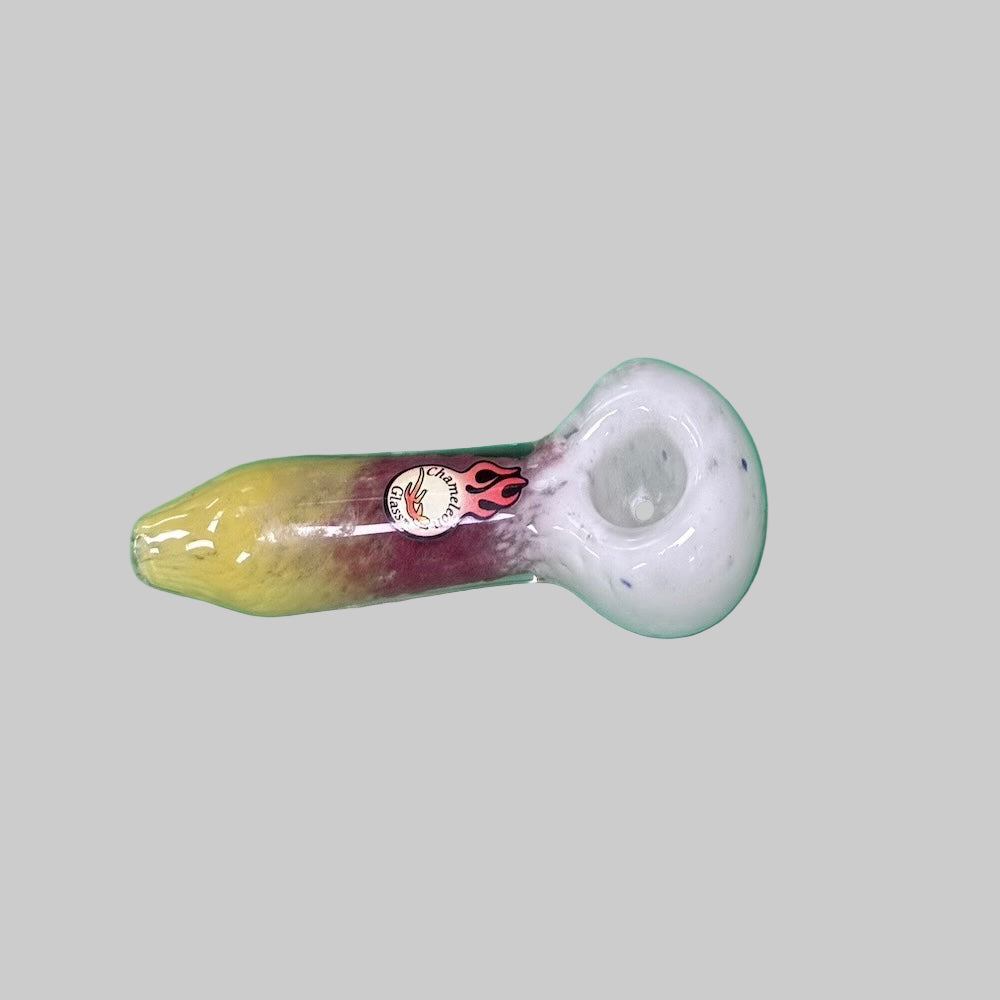 Glass pipe with a colorful design on a green background