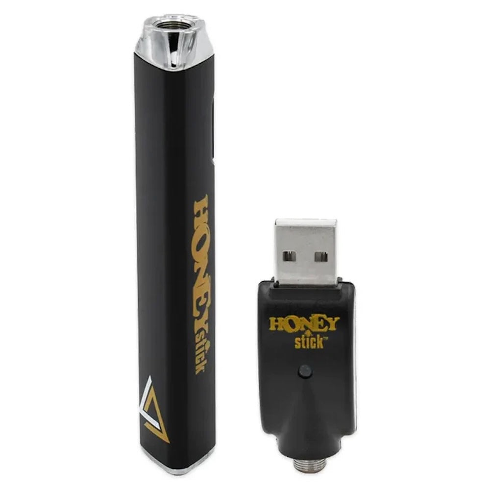 Black 'Honey Stick' electronic device with USB connector on a white background