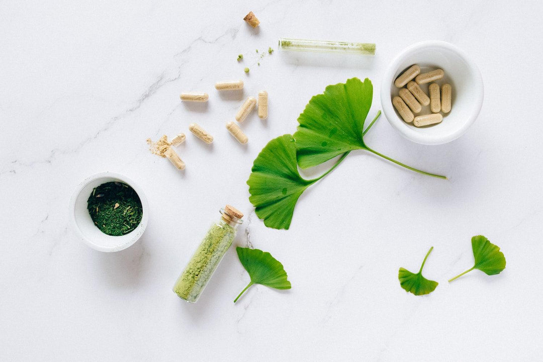 Strip NC body cleanse pills on table with other natural detox products