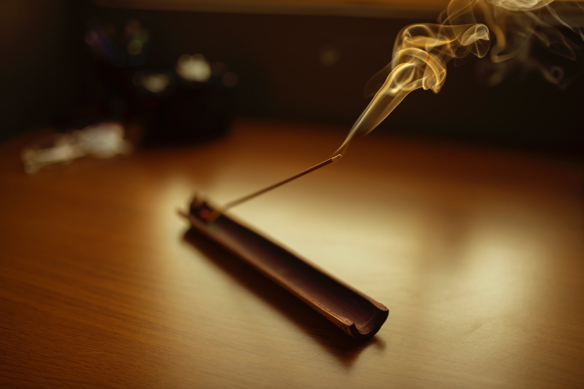 Incense burning on table 