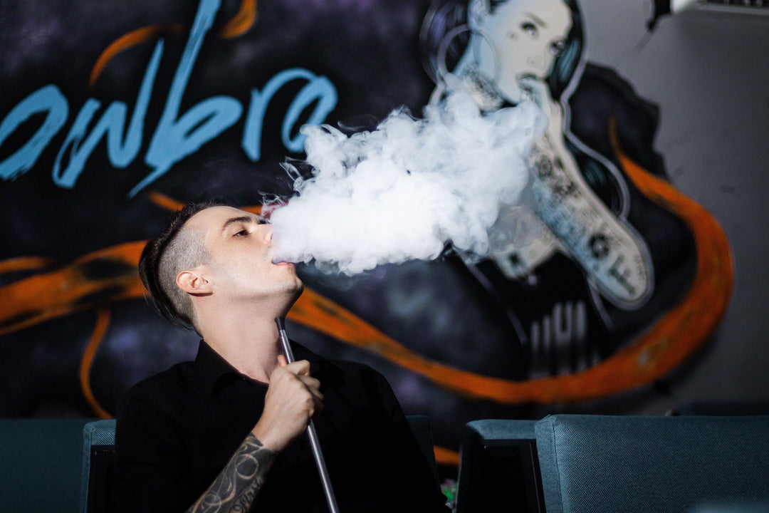 Man smoking Storz & Bickel Vaporizer