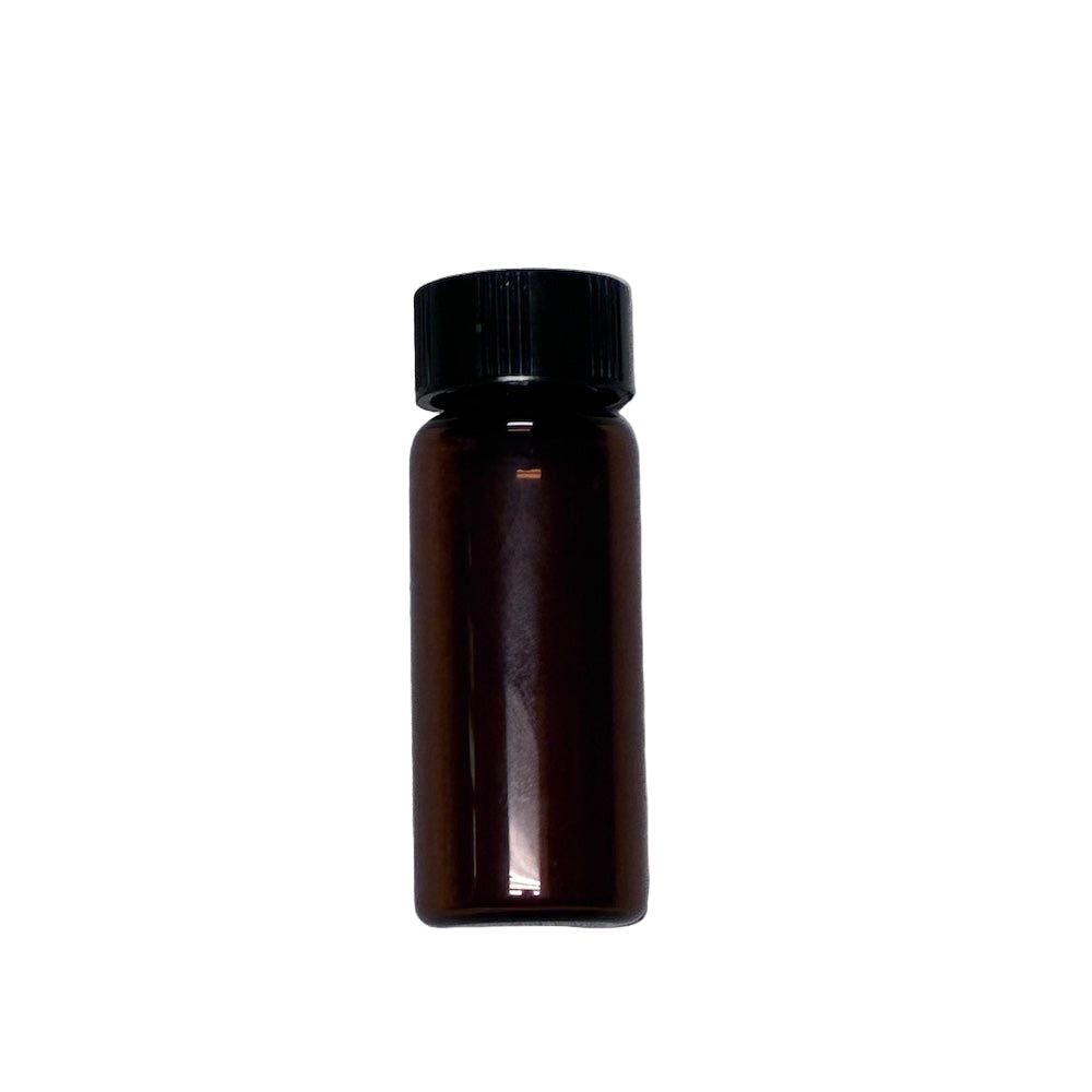 Brown bottle with black cap on a gray textured background
