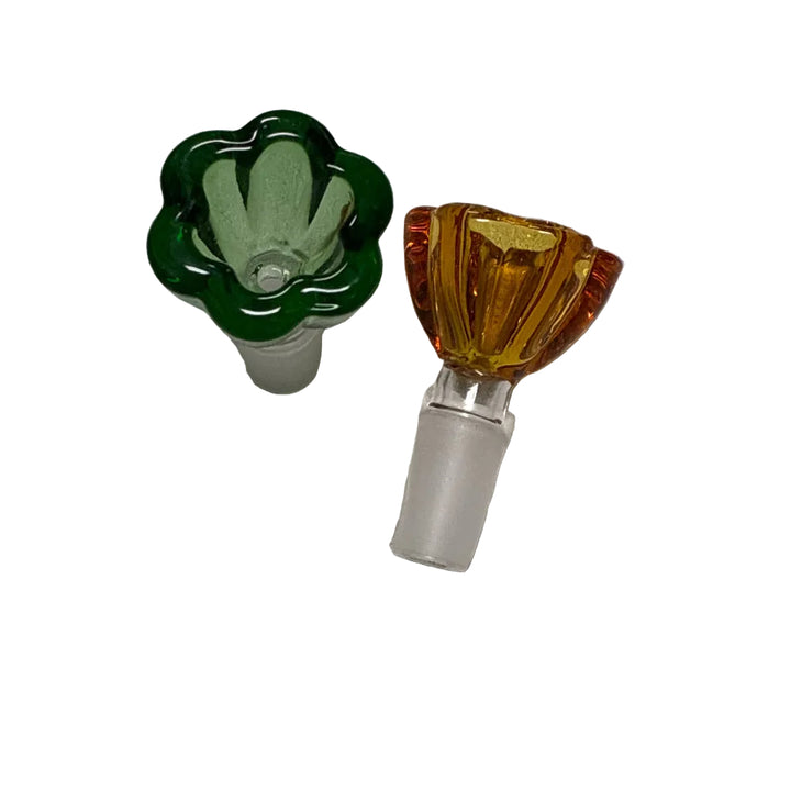 Two glass bong bowls, one green and one orange on a white surface.