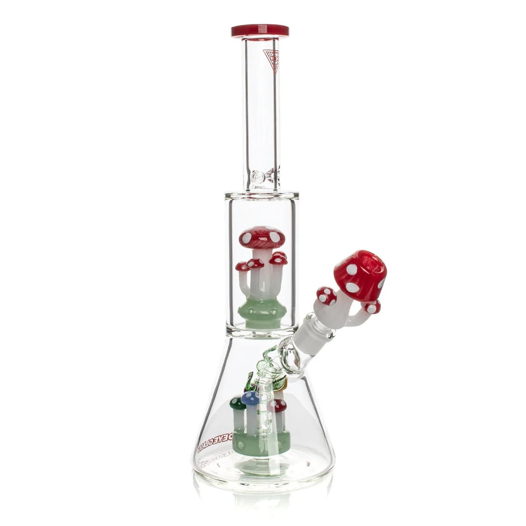 Glass smoking device with mushroom design on a white background