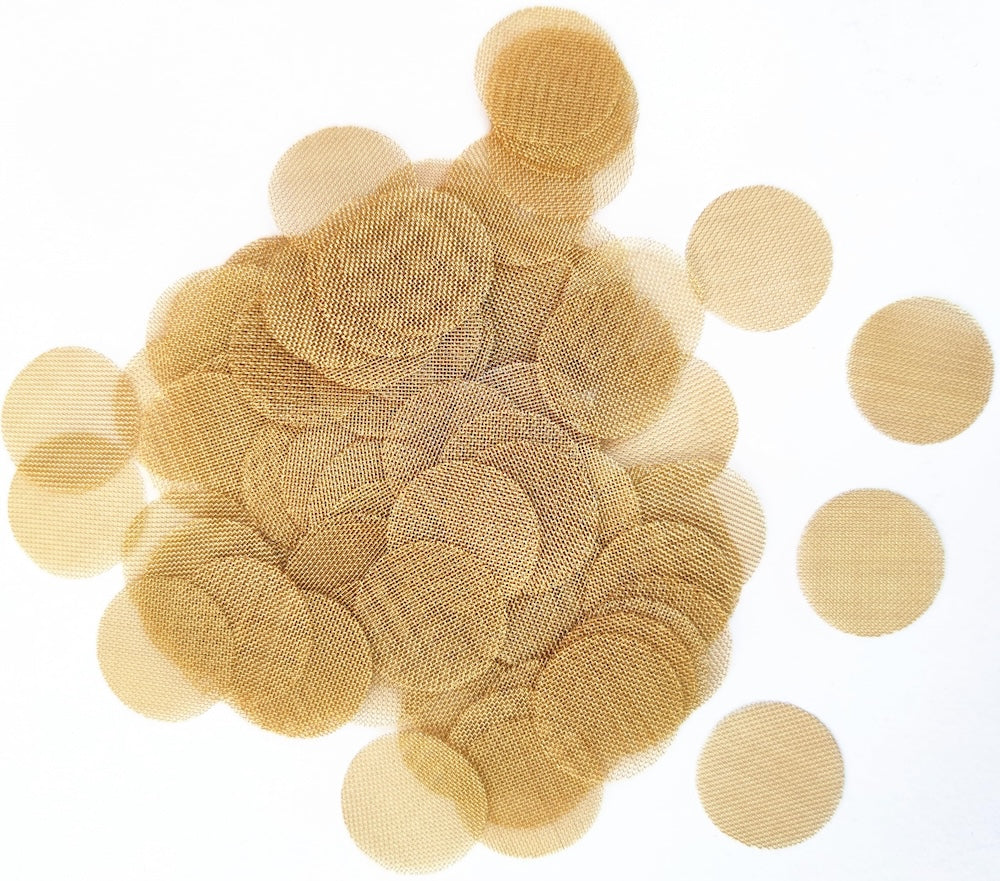 Brass mesh screens on white backround