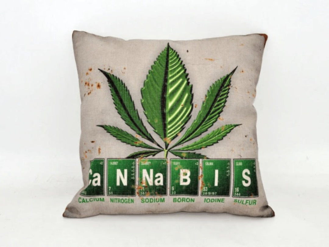 Pillow with cannabis leaf design and 'Cannabis' text on a white background