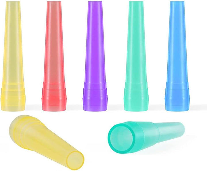 a bunch of colourful plastic pieces on a white background