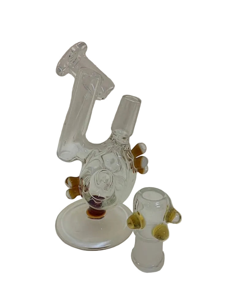 Clear glass smoking device with brown accents on a white background