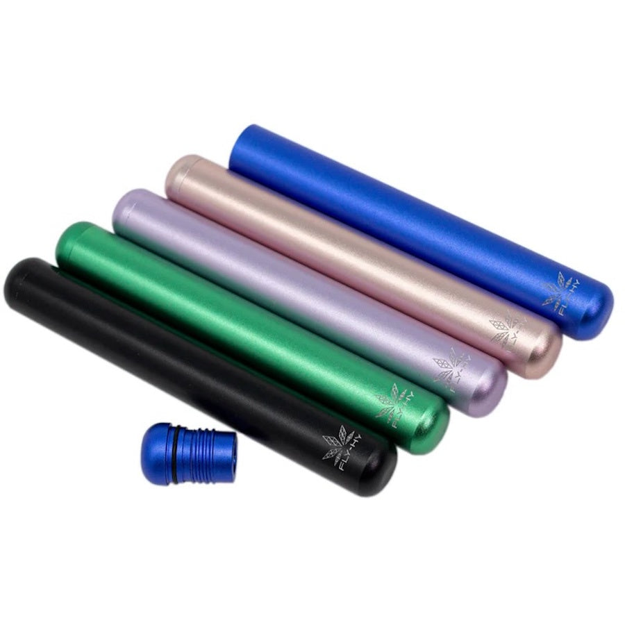 Set of colorful metal tubes with engraved designs on a white background