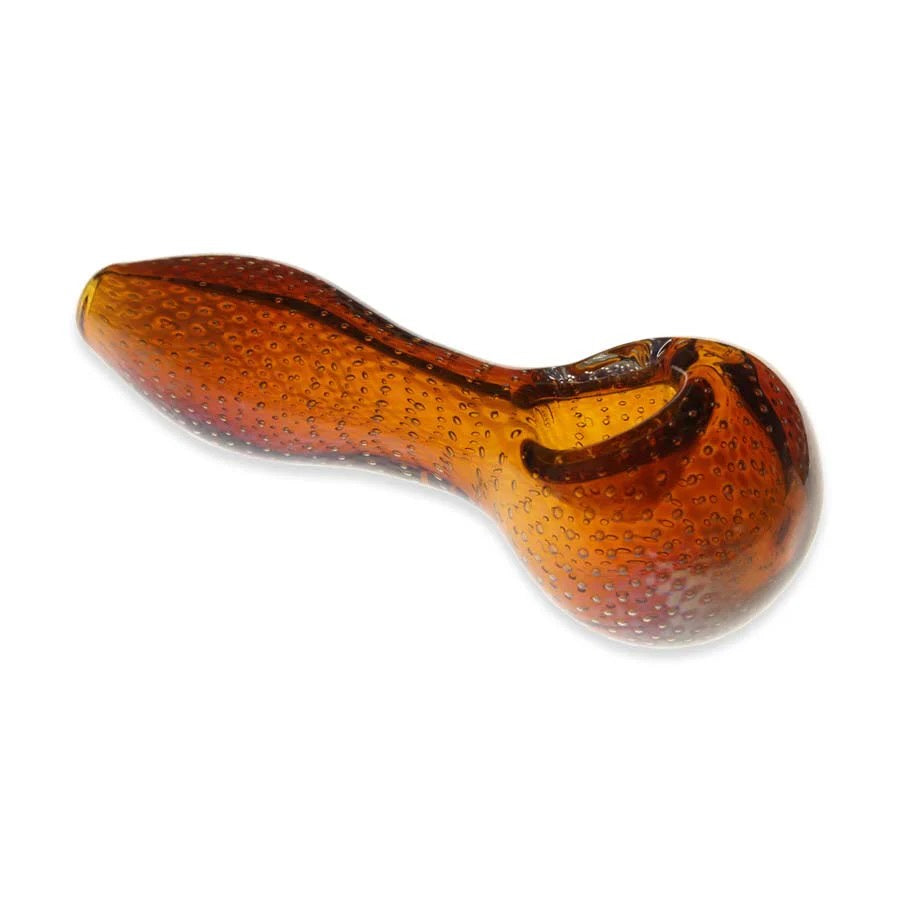 Glass pipe with brown and orange pattern on a white background