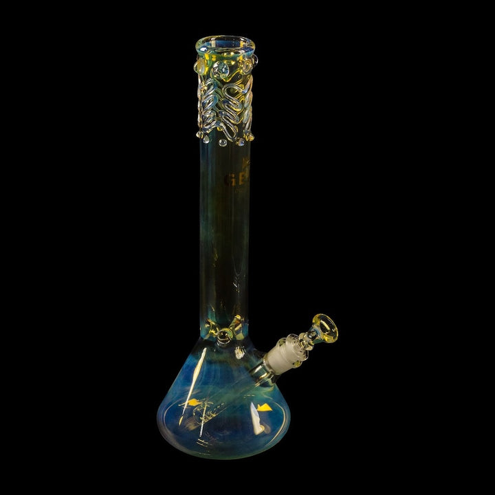 Glass smoking device with intricate designs on a black background