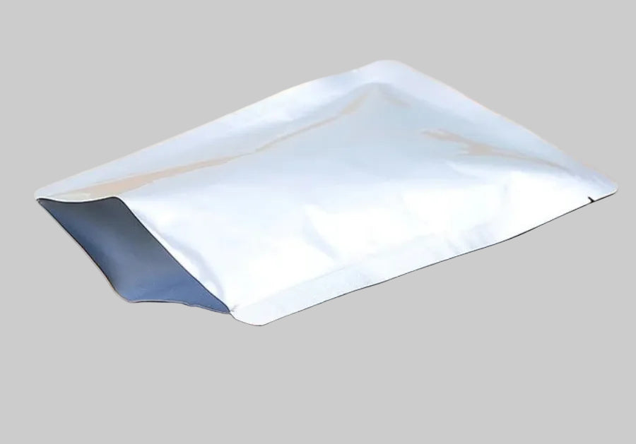 a silver foil bag on a white background