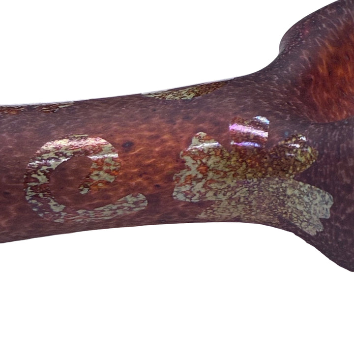 Close-up of a glass pipe neck with a textured surface on a white background