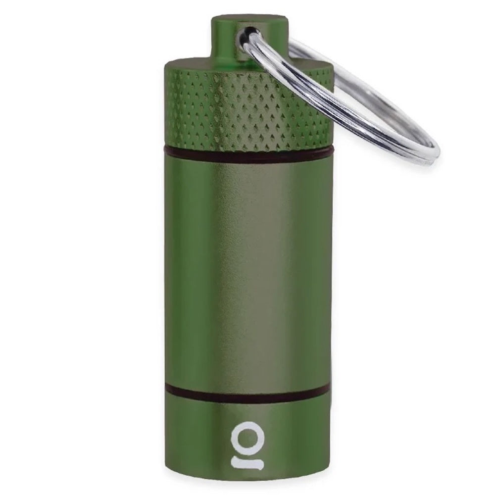 Green cylindrical container with a keyring on a white background