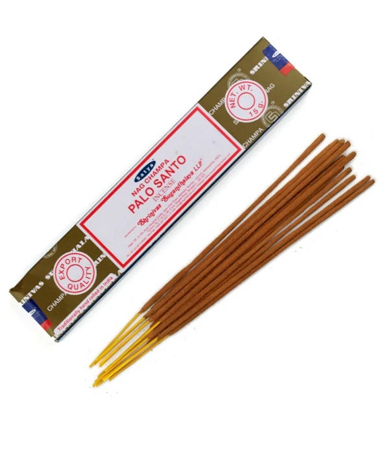 Box of Palo Santo incense sticks on a white background