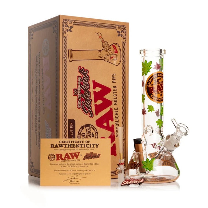RAW branded glass smoking accessory set with packaging on a white background