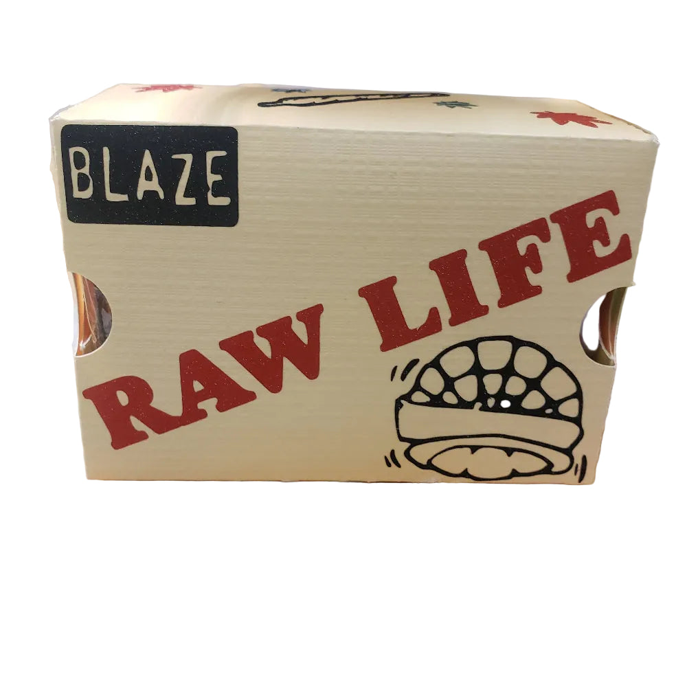 Box labeled 'Raw Life' with 'Blaze' branding on a wooden surface.