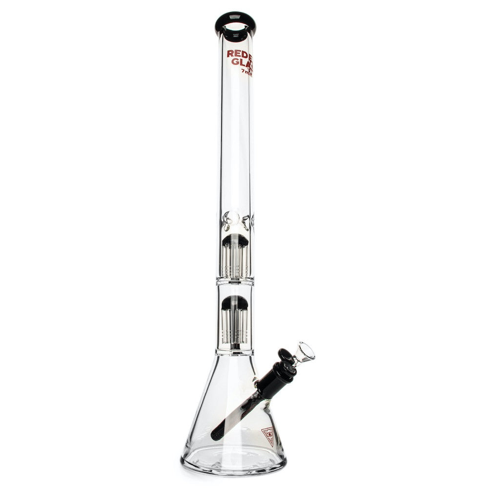 Clear glass smoking device with black accents on a white background