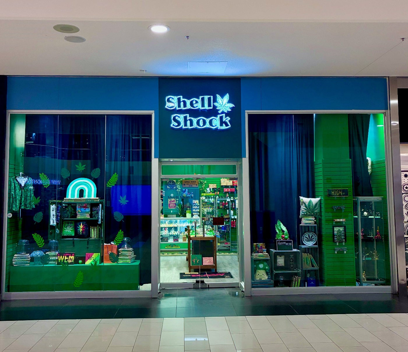 Shell Shock store front in a mall with blue and green decor