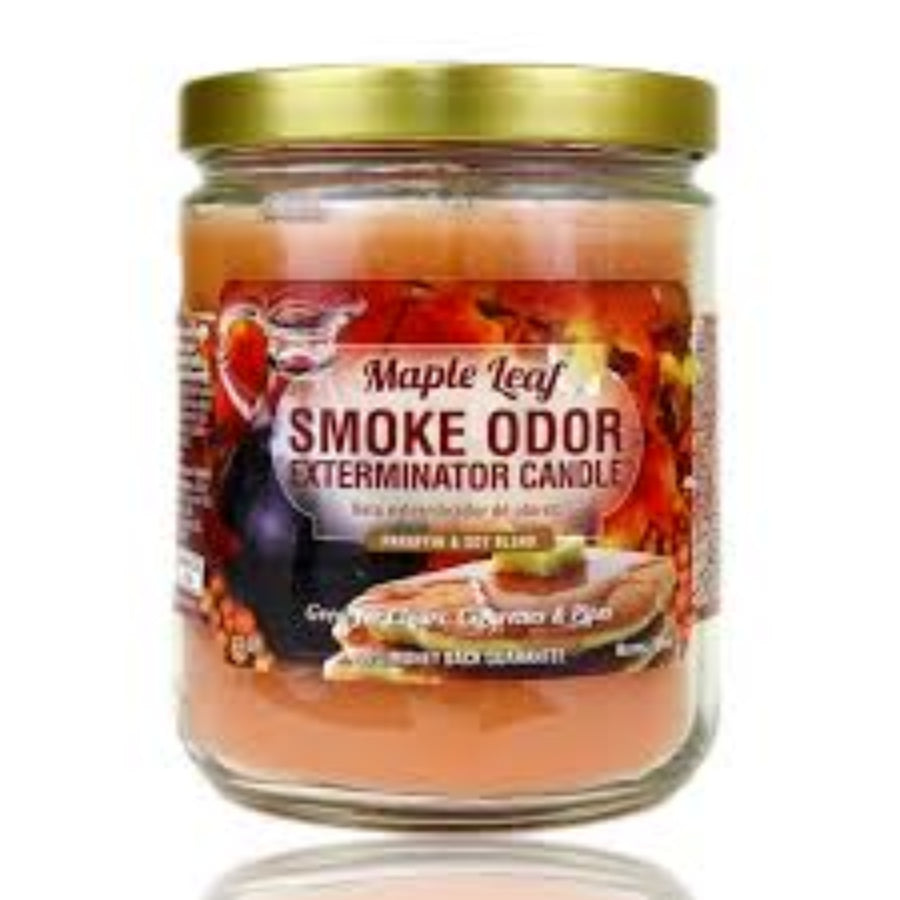 Jar of Maple Leaf Smoke Odor Exterminator Candle with gold lid on a white background