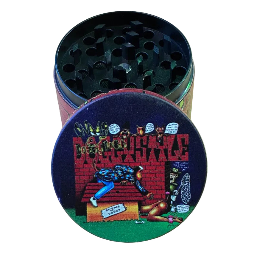 Metal grinder with doggystyle design on lid on a white backround
