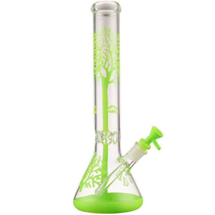 Glass smoking device with green base and tree design on a white background