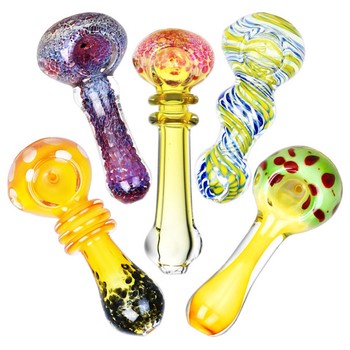 Colourful glass smoking pipes on a white background