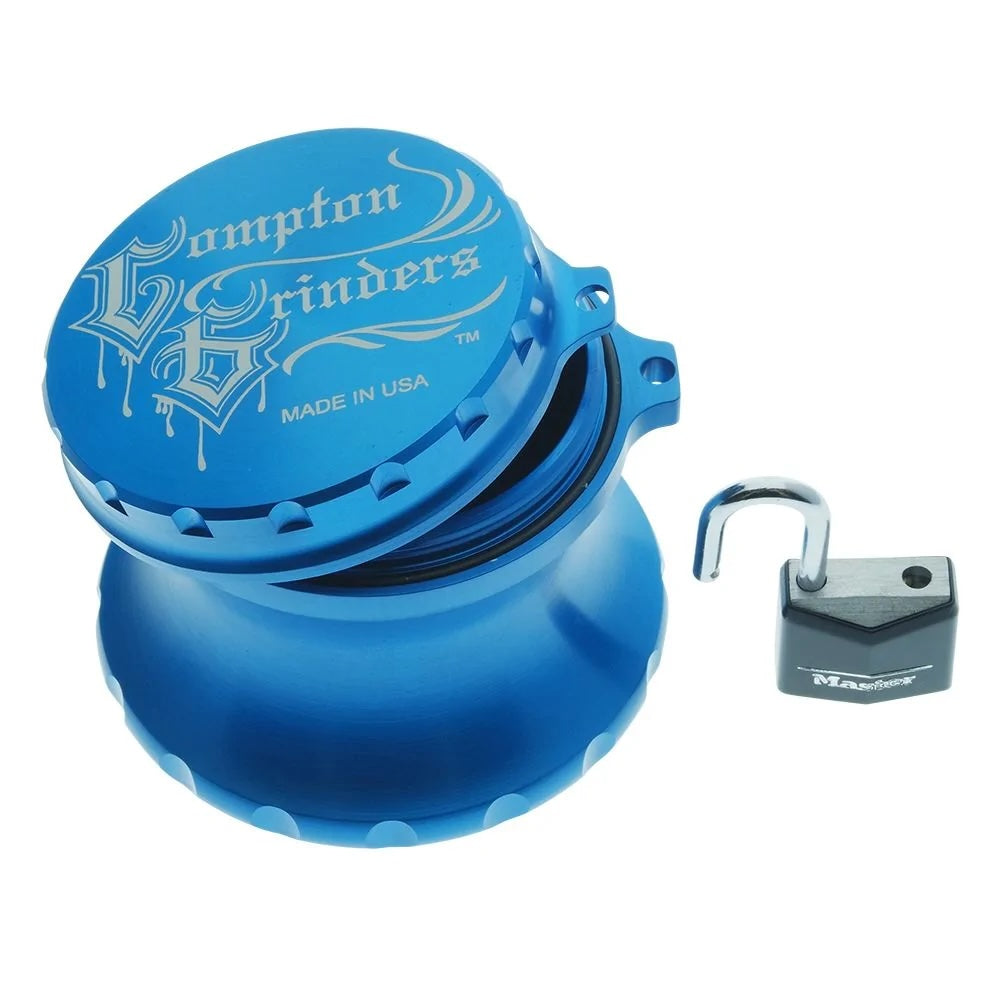 Blue herb grinder with a lock on a white background