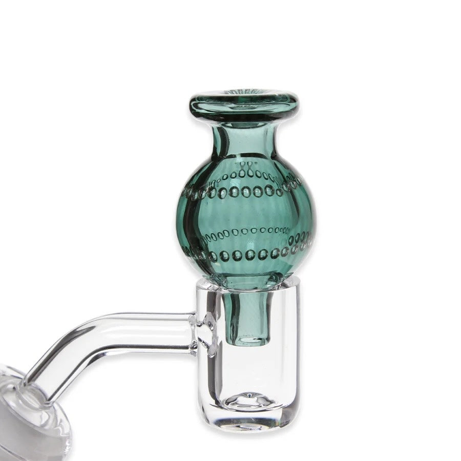 Glass carb cap with a teal bubble bowl on a white background