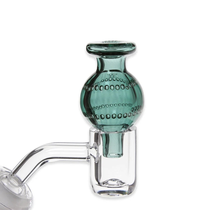 Glass carb cap with a teal bubble bowl on a white background