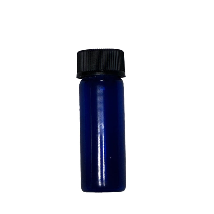 Blue bottle with black cap on a gray textured background