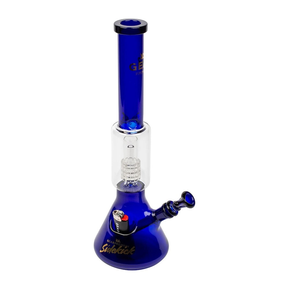 Blue glass smoking device with clear chamber on a white background