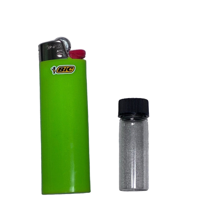 Green BIC lighter and a 5g vial on grey backround