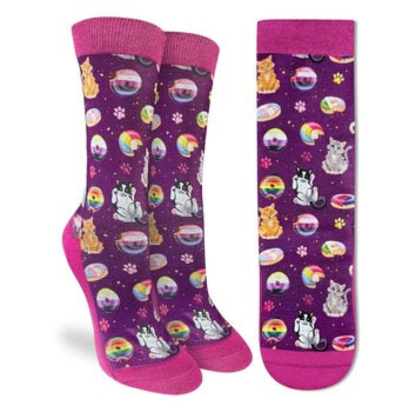Pair of socks with cat and rainbow designs on a purple background