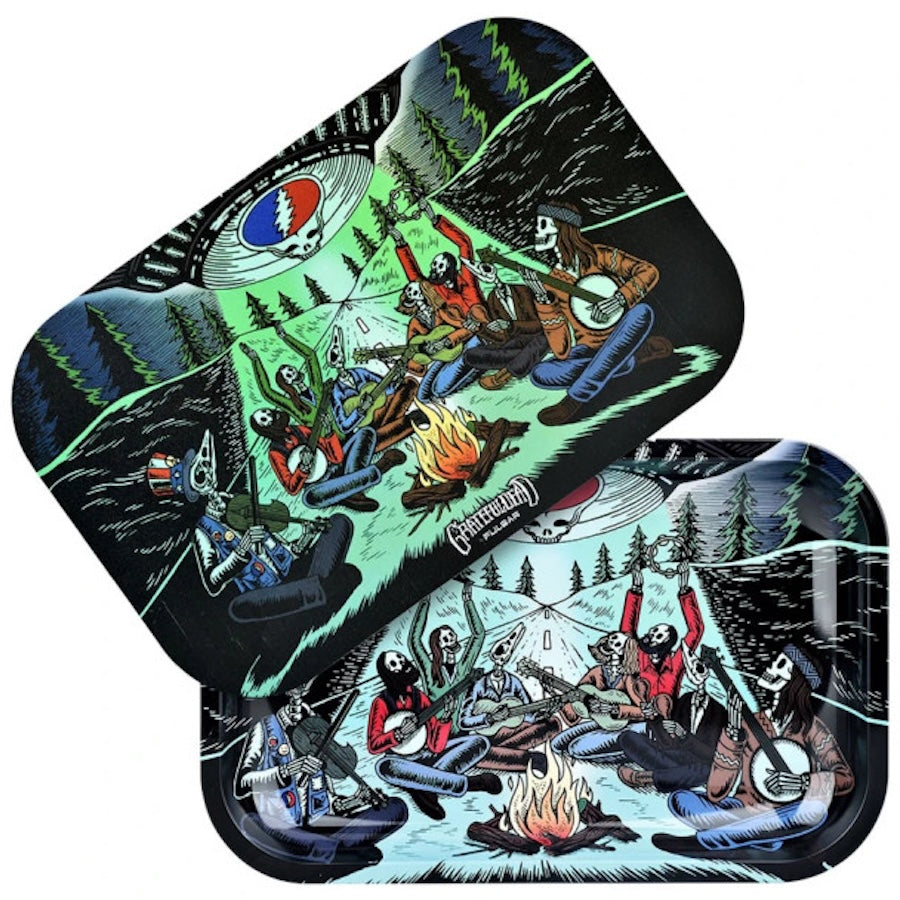Two rolling trays with a colorful design of people around a campfire, featuring a Grateful Dead logo.