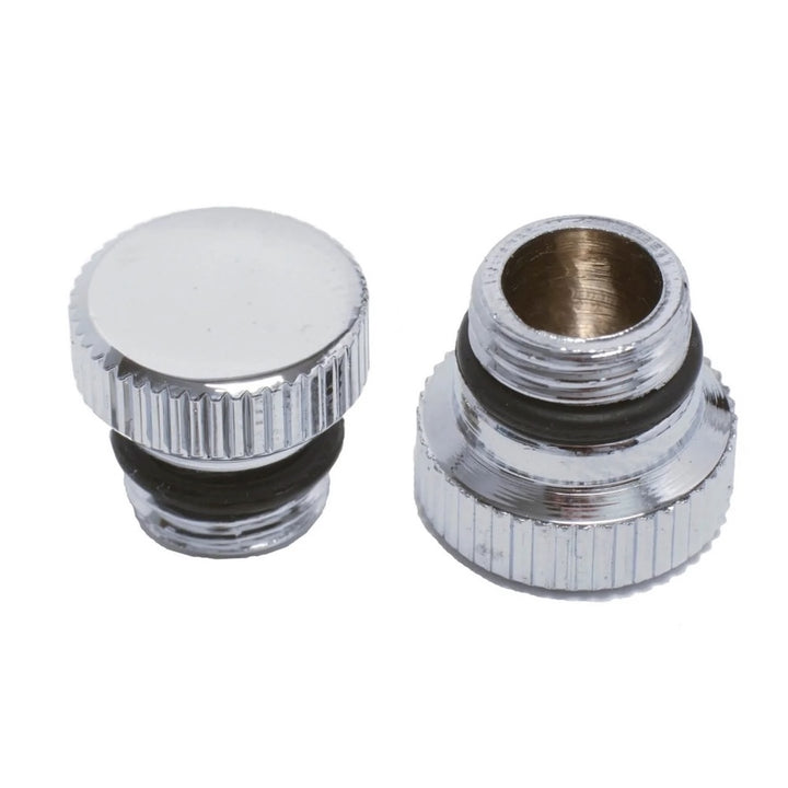 A metal hookah cap plug part on a white background