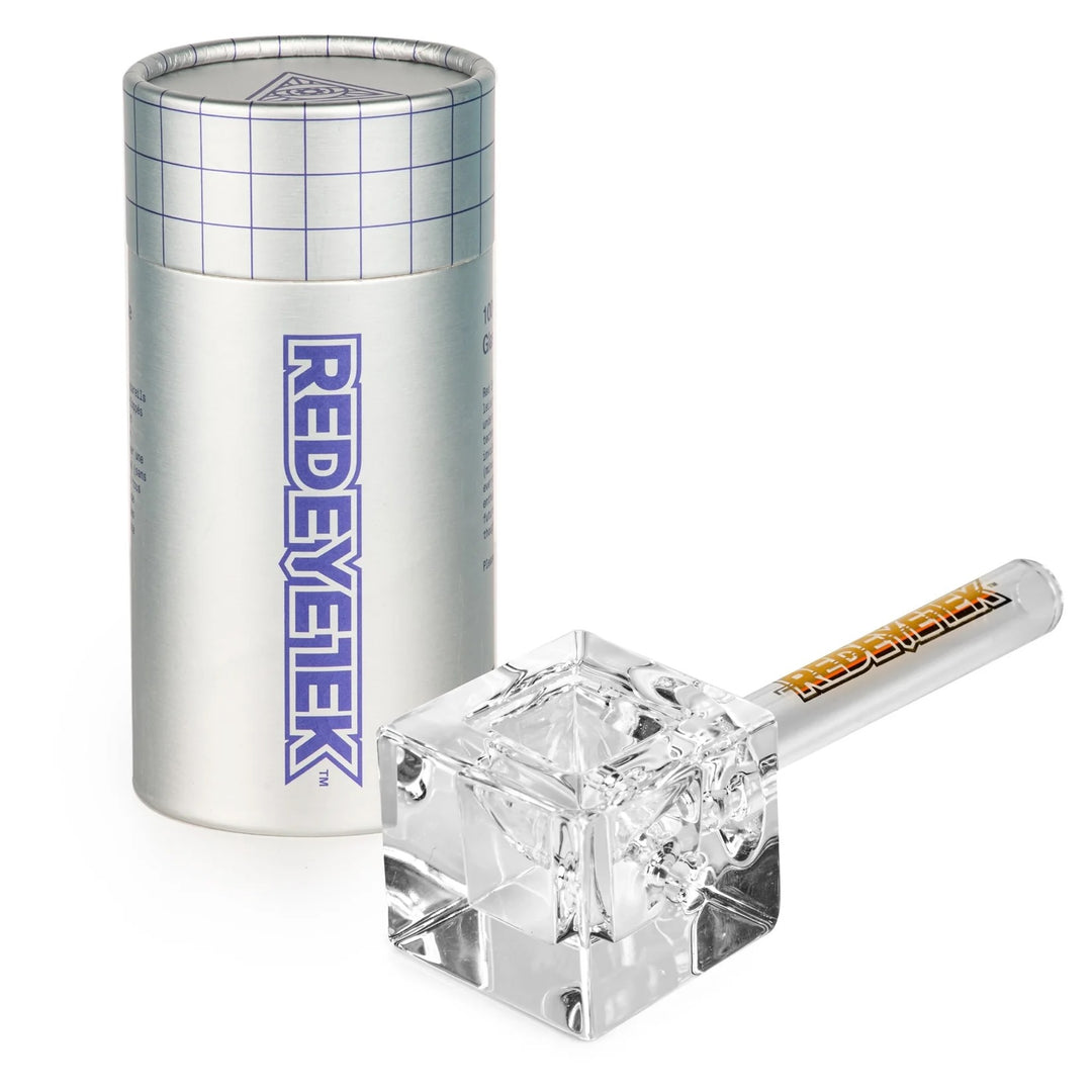 Clear crystal-like object with 'REDEYE TEK' branding next to a cylindrical container on a white background.
