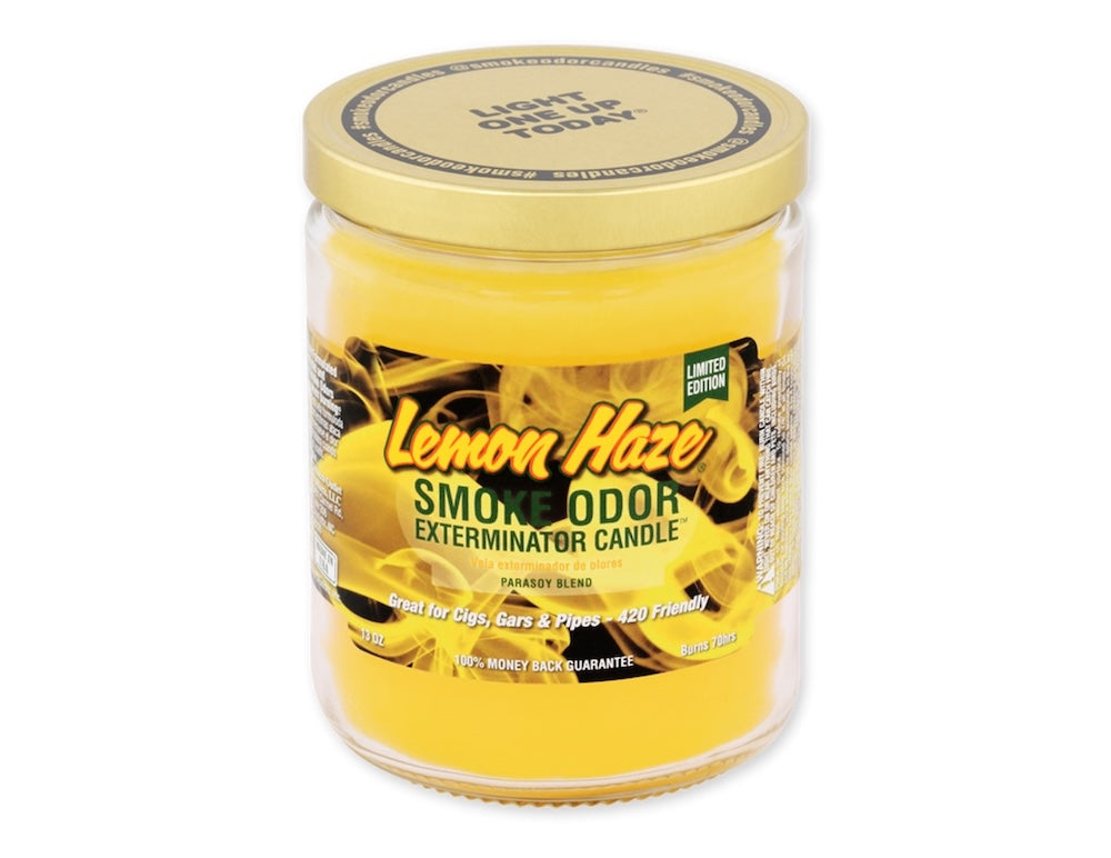 Lemon haze smoke odor exterminator candle with yellow label on a white background