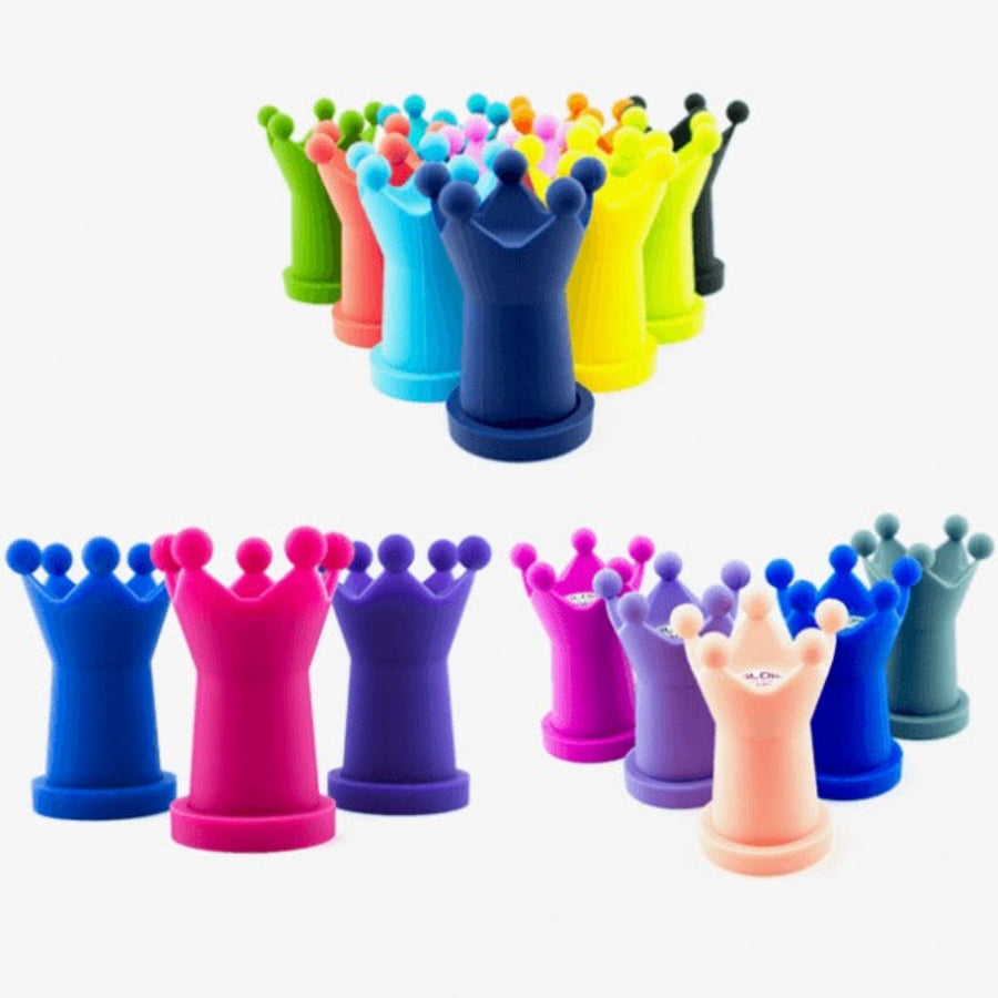 Colorful crown-shaped items on a white background