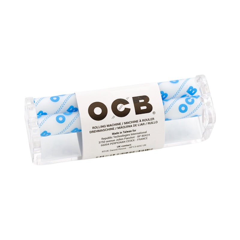 A packaged OCB rolling machine set, featuring a clear plastic case containing white and blue patterned discs, with a white paper label displaying the brand 'OCB'.