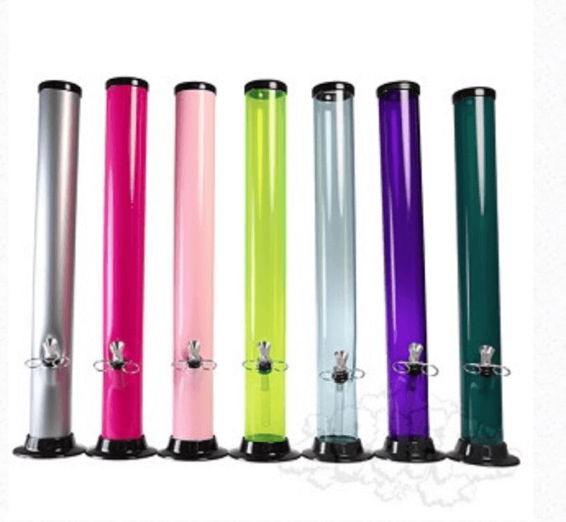 Set of colorful cylindrical drink dispensers on a white background