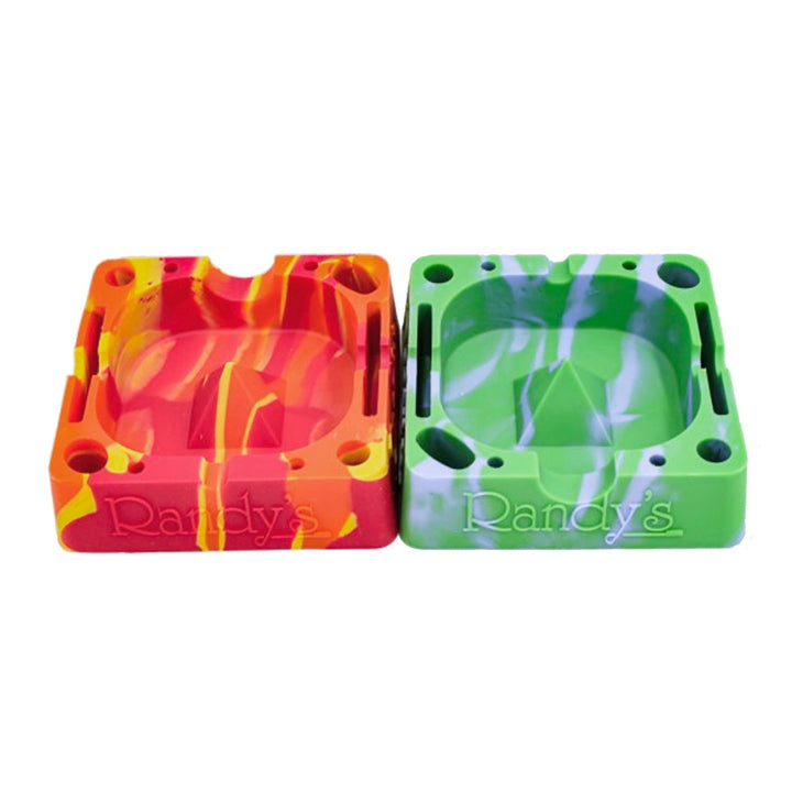 Two colorful silicone ashtrays with 'Randy's' branding on a white background