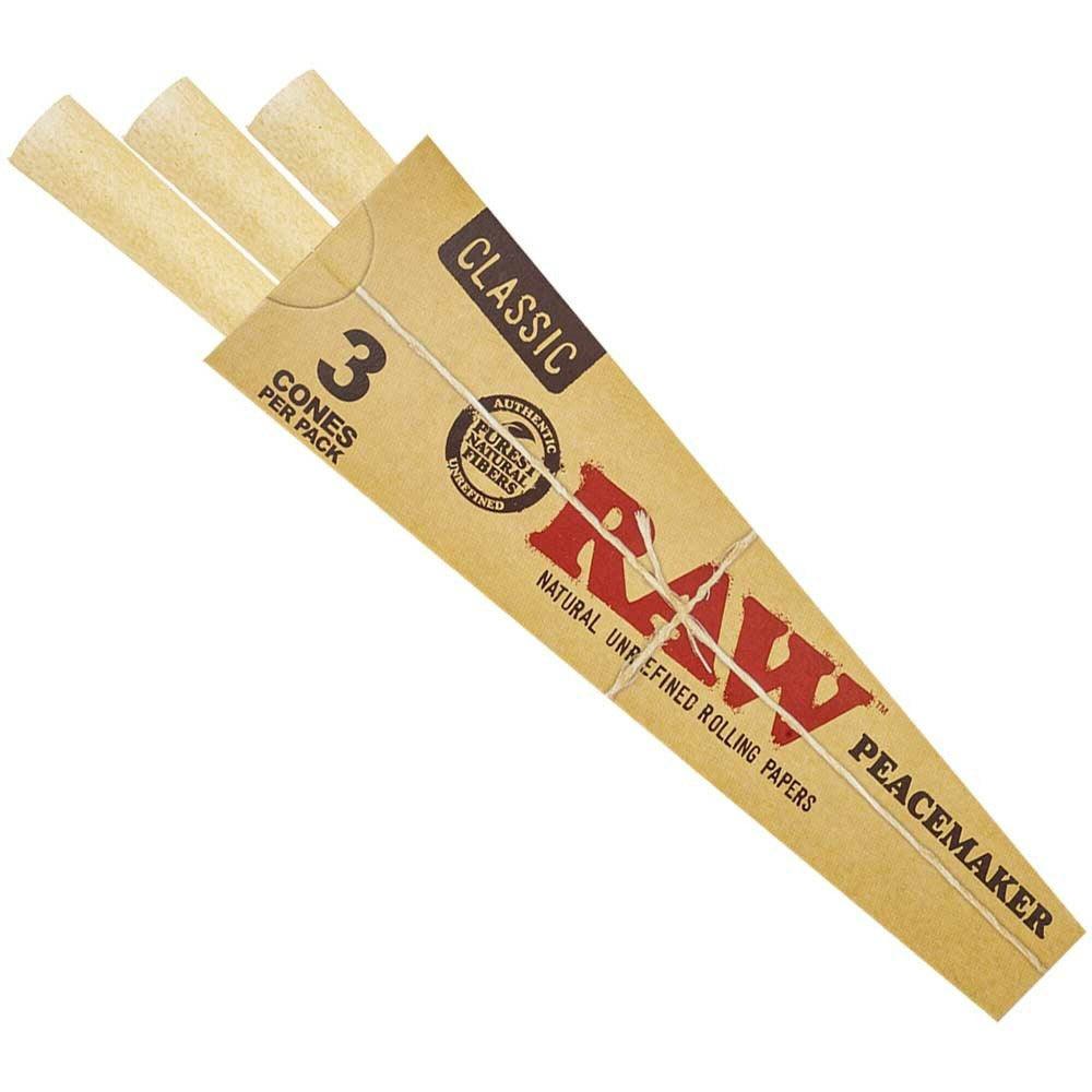 Pack of Raw Peacemaker rolling papers with three cones on a white background