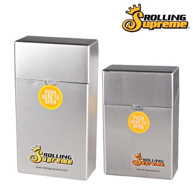 Two silver Rolling Supreme cigarette cases with yellow 'Push Here to Open' stickers on a white background.