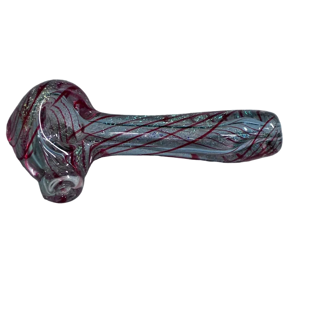 Glass pipe with purple and dichro wrap design on a white surface