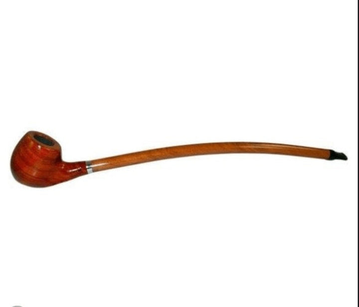 Wooden pipe on a white background