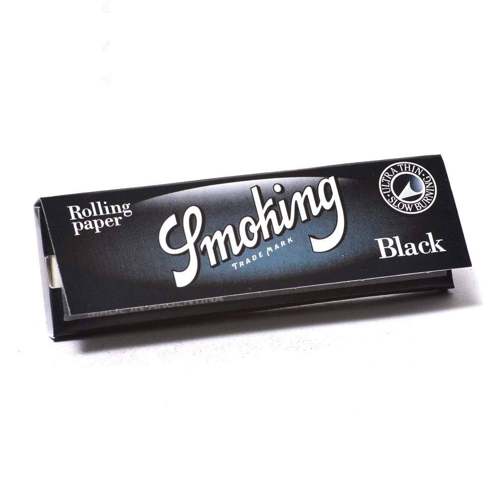 Smoking black rolling papers king size on white backround
