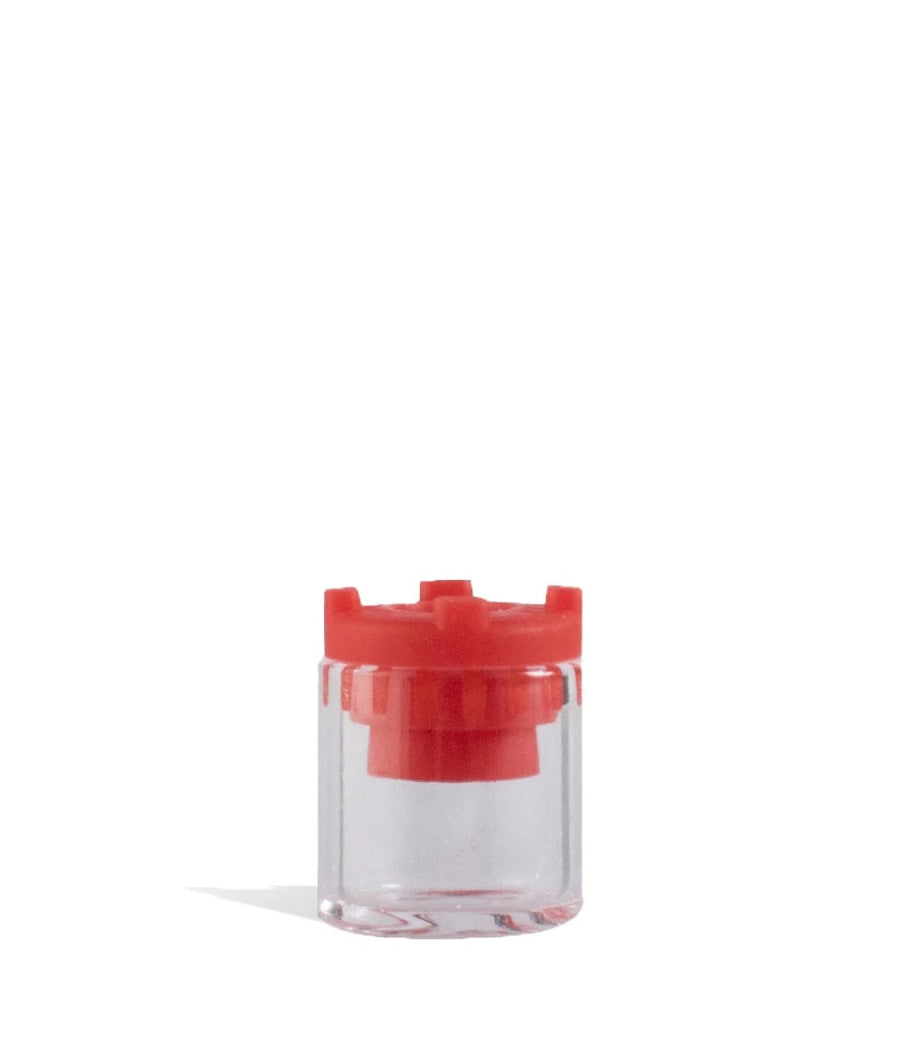 a small red and clear oil cup piece on a white background