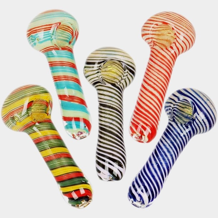 Five colorful glass pipes with striped patterns on a white background