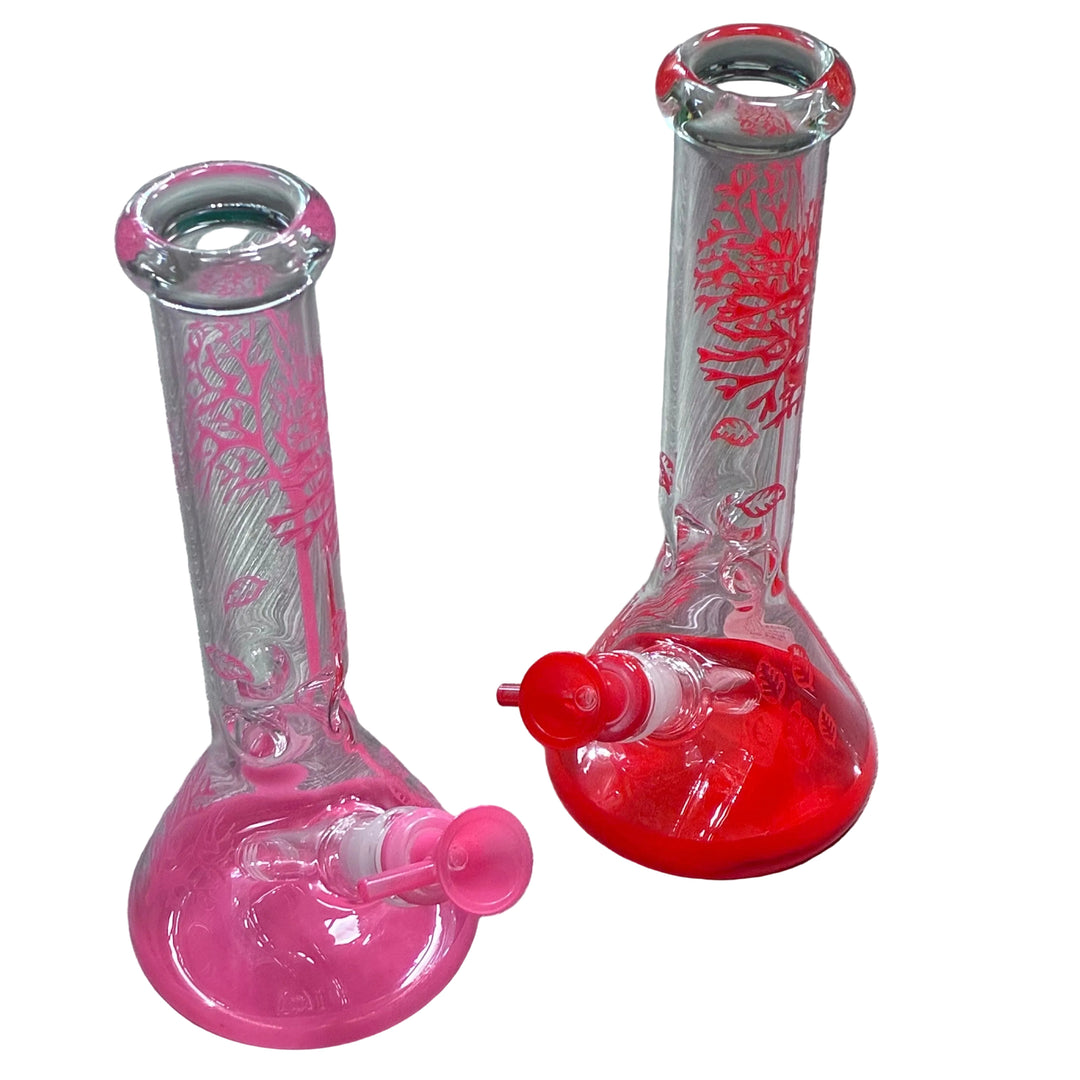 Two glass smoking devices, one pink and one red, on a white background